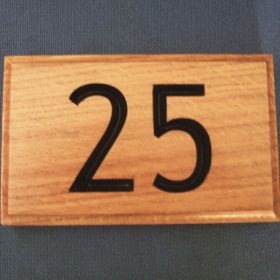 Choose to have your numbers painted after they are carved to help them really stand out. 