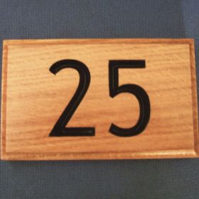 Choose to have your numbers painted after they are carved to help them really stand out. 